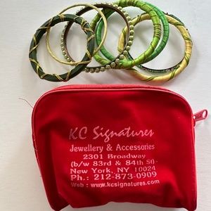 Set of 7 green metal and fabric bangles